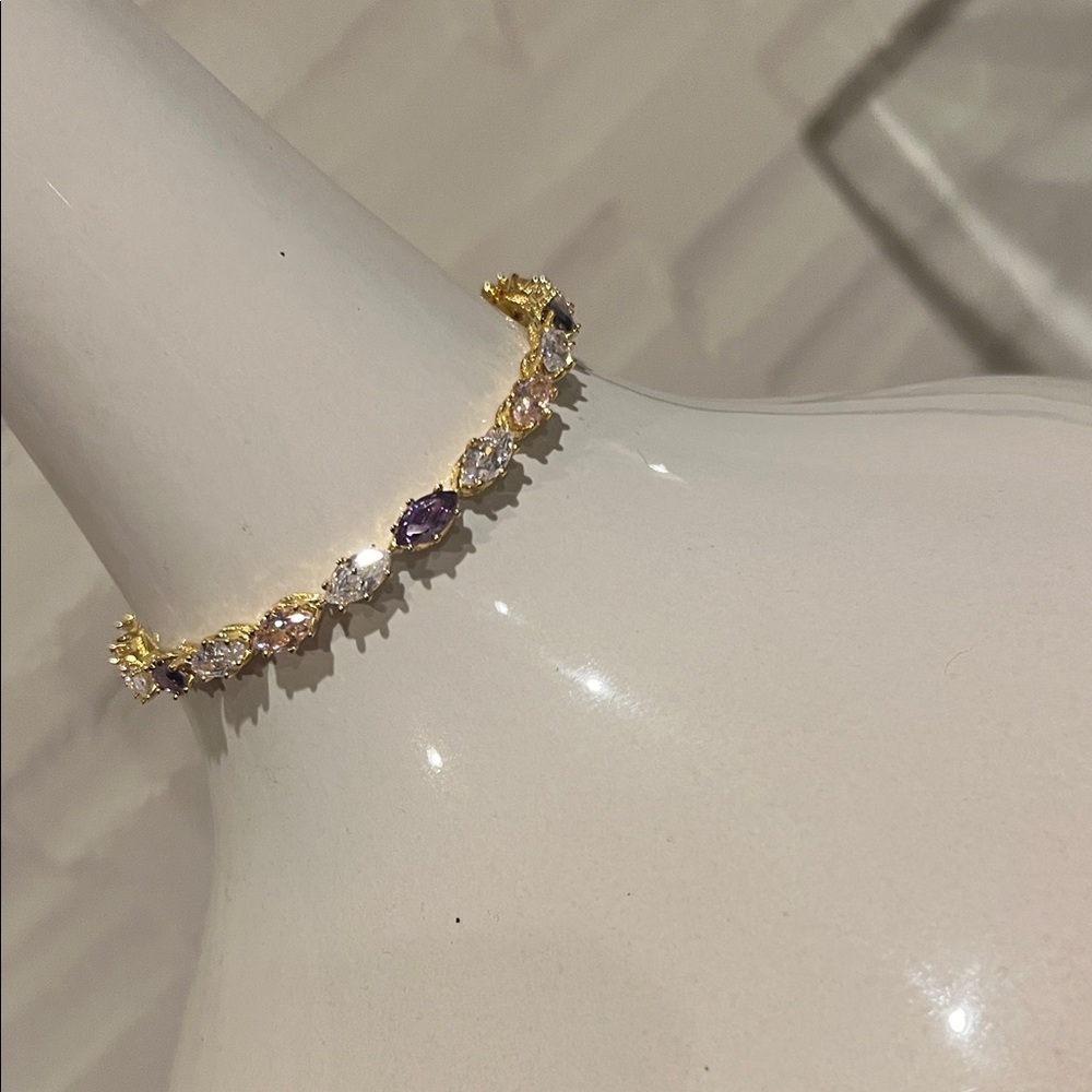 Elegant Gold and Purple Bracelet
